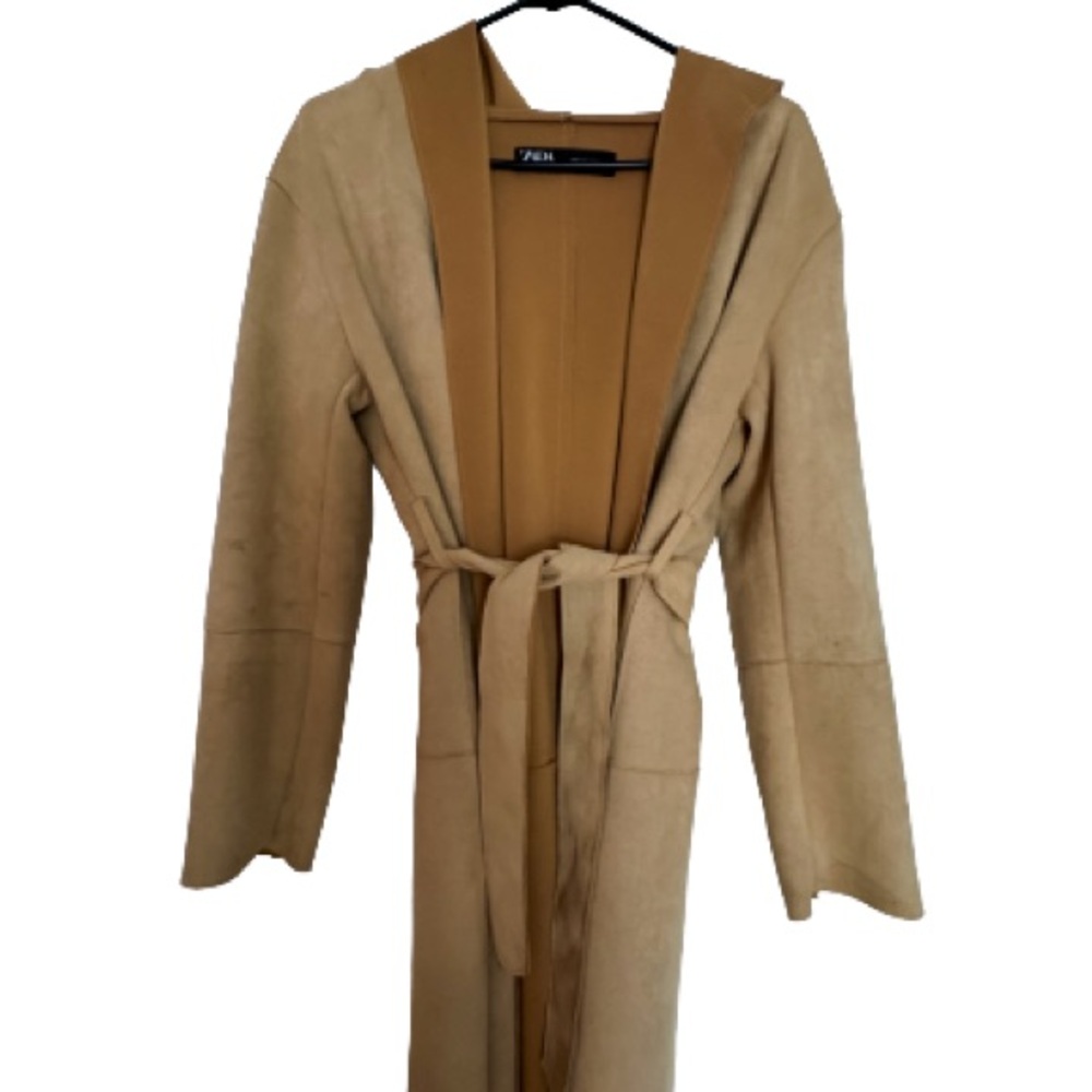 Woman’s long cardigan/robe-style coat from Zara.